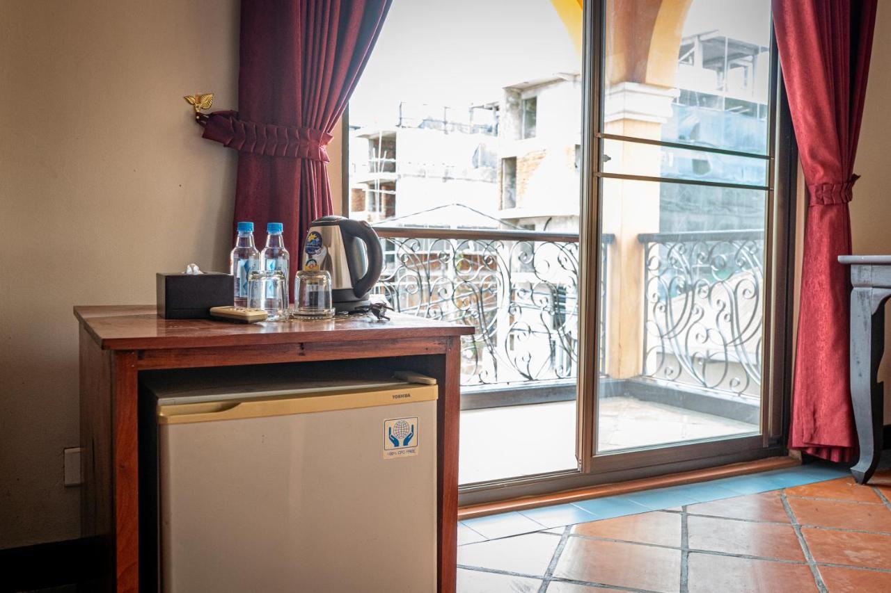 Den Hotel Totonou Siem Reap Bagian luar foto