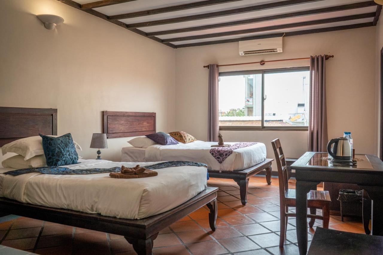 Den Hotel Totonou Siem Reap Bagian luar foto