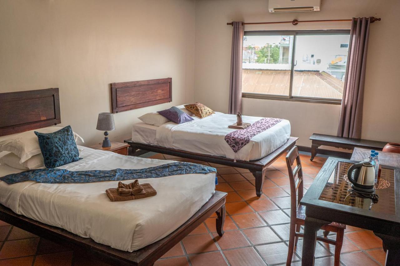Den Hotel Totonou Siem Reap Bagian luar foto